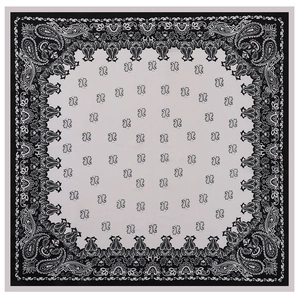 Detailed top view of a 70cm square silk scarf featuring symmetric black and white paisley patterns