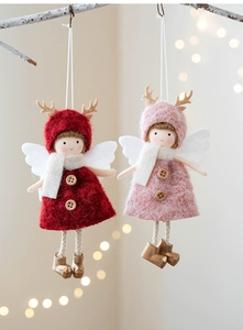 Detail of plush Christmas angel doll ornaments with deer antlers and white wings
