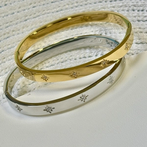 Minimalist 18K gold and silver stainless steel bangles with CNC zircon star engravings