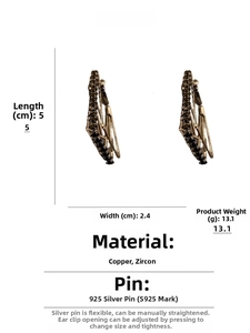 Detail showing 5cm length and 2.4cm width of geometric black zircon earrings