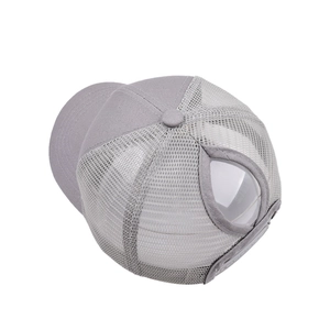 Close-up of gray ponytail baseball cap featuring breathable mesh and back opening