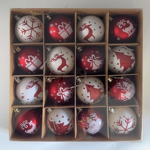 Macro view of 16-piece set Christmas balls with glitter snowflake and reindeer patterns