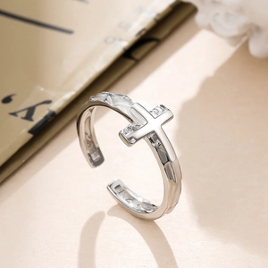 Minimalist S925 silver open cross ring with irregular lava texture and vintage design