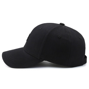 Classic black six-panel baseball cap with curved brim and adjustable strap side view