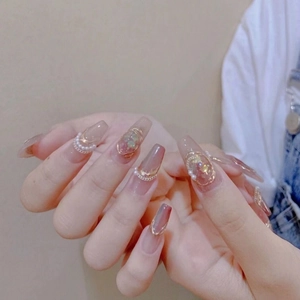 Handmade nude pink press-on nails with gold wire, pearls and aurora stone decoration