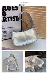 Detail of silver metallic PU shoulder bag with dual rows of metal rivets on wide strap
