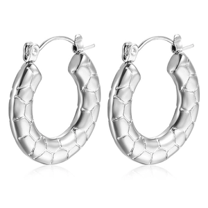 Polished silver stainless steel hoop earrings featuring a unique hexagonal honeycomb texture