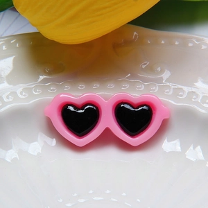 Pink heart-shaped doll sunglasses with black lenses for DIY crafts and pet accessories