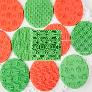 Christmas snowflake and tree cookie cutter set with various festive embossed patterns