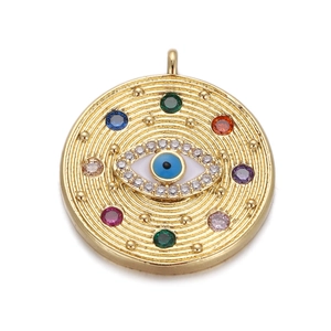 Macro shot of evil eye pendant with colorful gemstones and gold plating detail
