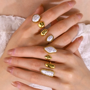 Baroque pearl gold rings in irregular shapes for women with minimalist open design