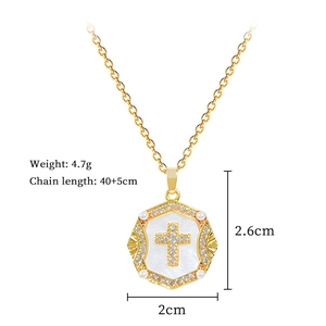 Detail of cross pendant with pearl and shell inlay, including size and weight specs