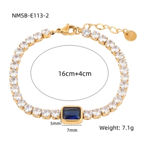 Detail showing gold tennis bracelet dimensions 16cm plus 4cm and blue rectangle gem