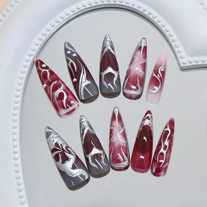 Gothic dark red ombre stiletto press-on nails with silver metallic liquid flame designs