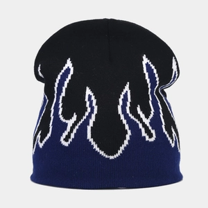 Detailed view of knitted beanie with flame jacquard pattern and premium stitch texture