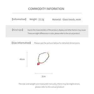 Detailed view of colorful glass bead necklace with 2cm red heart pendant and dimensions