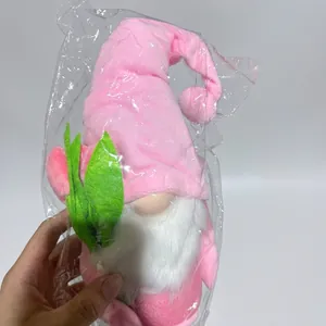 Pink Mother's Day gnome plush toy with long beard and green leaf detail in hand