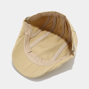 Inside view of khaki cotton twill beret with sweatband and metal adjustment buckle