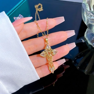 Hollow gold-plated titanium cross pendant necklace with sparkling micro-set zircons