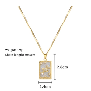 Detail of tarot card pendant with moon and stars including weight and chain dimensions