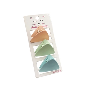 Set of 3 matte pastel mini hair claws in orange, mint green, and misty blue for women