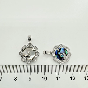 18K plated rabbit pendant with zircon paving and natural shells on a cm scale
