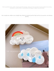 Detailed view of an 8cm acetate cloud hair claw clip with pearlescent rainbow and rain design