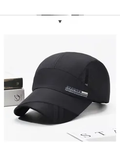 Detail view of breathable black sports cap with mesh fabric and SPORTS embroidery