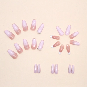 Faux ongles ballerine dégradés roses avec strass et bordures French pailletées