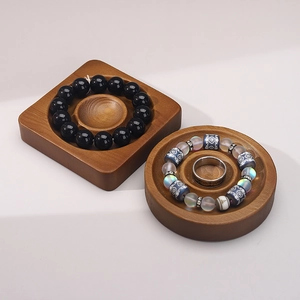 Solid wood jewelry display trays for bracelets and rings in round and square shapes