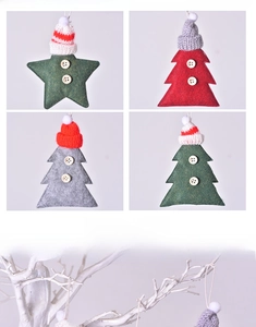 Detail of felt Christmas star and tree ornaments with mini knit hats and button accents