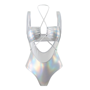 Detailed flat lay of silver holographic laser swimsuit with cutout design and metallic finish