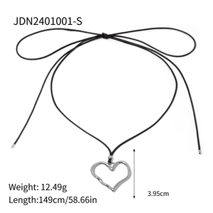 Silver stainless steel heart pendant necklace with long black wax cord on white background