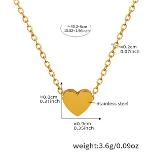 Macro shot of 18K gold plated stainless steel heart pendant with precise measurements