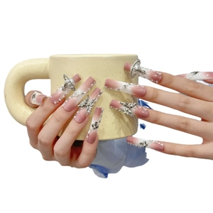 Pink and white gradient long coffin press-on nails with silver butterfly and pearl charms