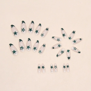 Army green star print almond press-on nails with small rhinestone accents on nude base