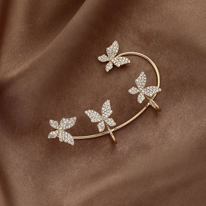 Luxurious gold butterfly ear cuffs with sparkling crystals for non-pierced ears