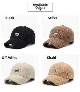Detail view of teddy fleece baseball caps in four colors with min letter embroidery