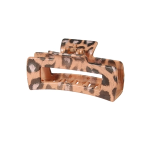 Detail shot of the large hollow leopard print hair claw clip with strong metal spring