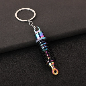 Rainbow plated metal car shock absorber keychain with realistic black coil spring model