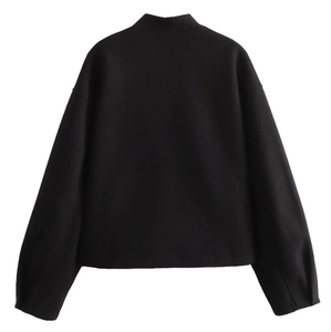 Rear view of loose-fitting black knit bomber jacket with ribbed collar and long sleeves