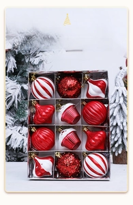 Close-up of 12-pack assorted red and white Christmas baubles in various shapes and glitters