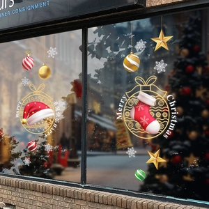Christmas window stickers with Santa hat, socks, and snowflakes for holiday glass decor