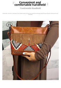Detail of bohemian woven tote bag featuring long brown fringe and leather textures