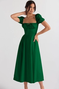 Detail of a dark green A-line dress with puff sleeves and pleated drawstring neckline