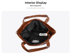 Detailed overhead view of brown tote bag interior featuring zipper pocket and main compartment