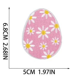 Pink egg-shaped Easter embroidery patch with daisy print and size dimensions 6.8x5cm