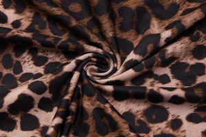 Macro shot of Leopard print fabric texture with fine horizontal knit and soft drape
