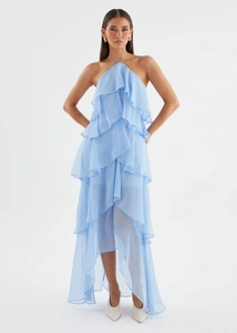 Detail of light blue halter neck tiered ruffle dress with asymmetric layered hemline