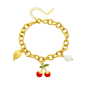 Gold chunky chain bracelet featuring cherry charms, metal leaf, and baroque pearl accent